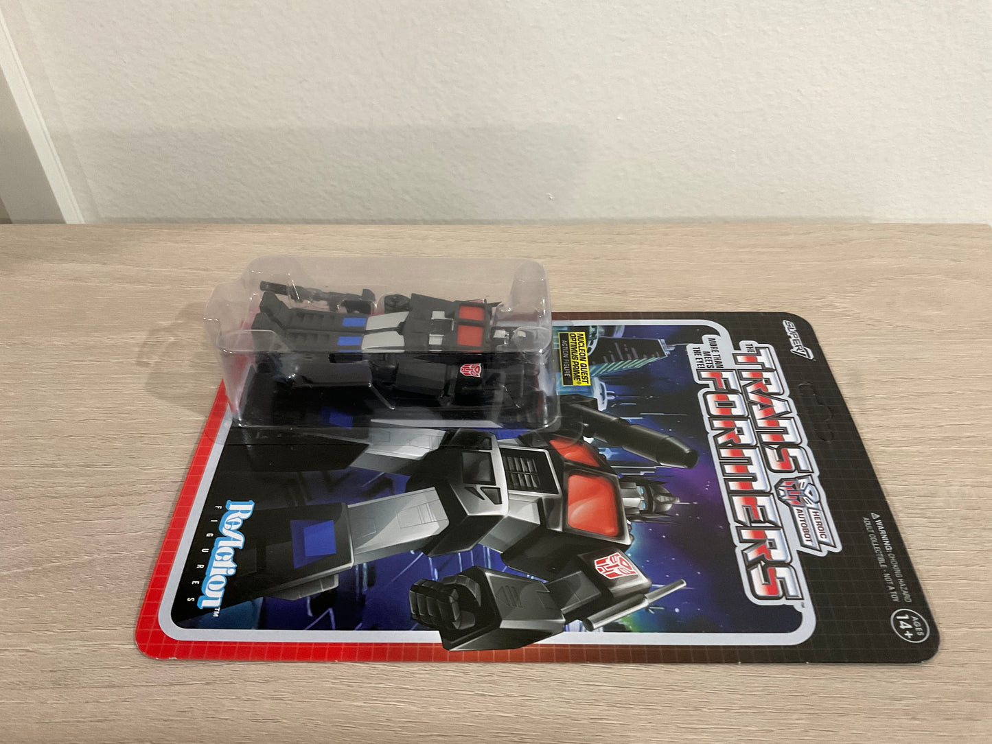 Transformers ReAction Figure – Optimus Prime (Nucleon Quest Special) 3.75-Inch by Super7