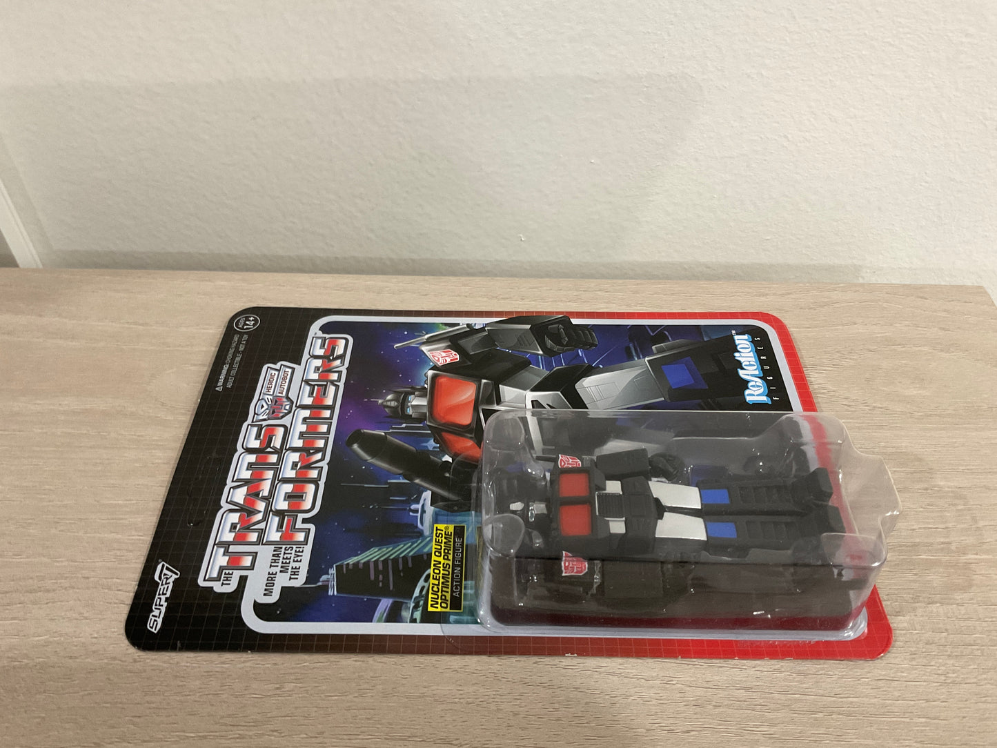 Transformers ReAction Figure – Optimus Prime (Nucleon Quest Special) 3.75-Inch by Super7