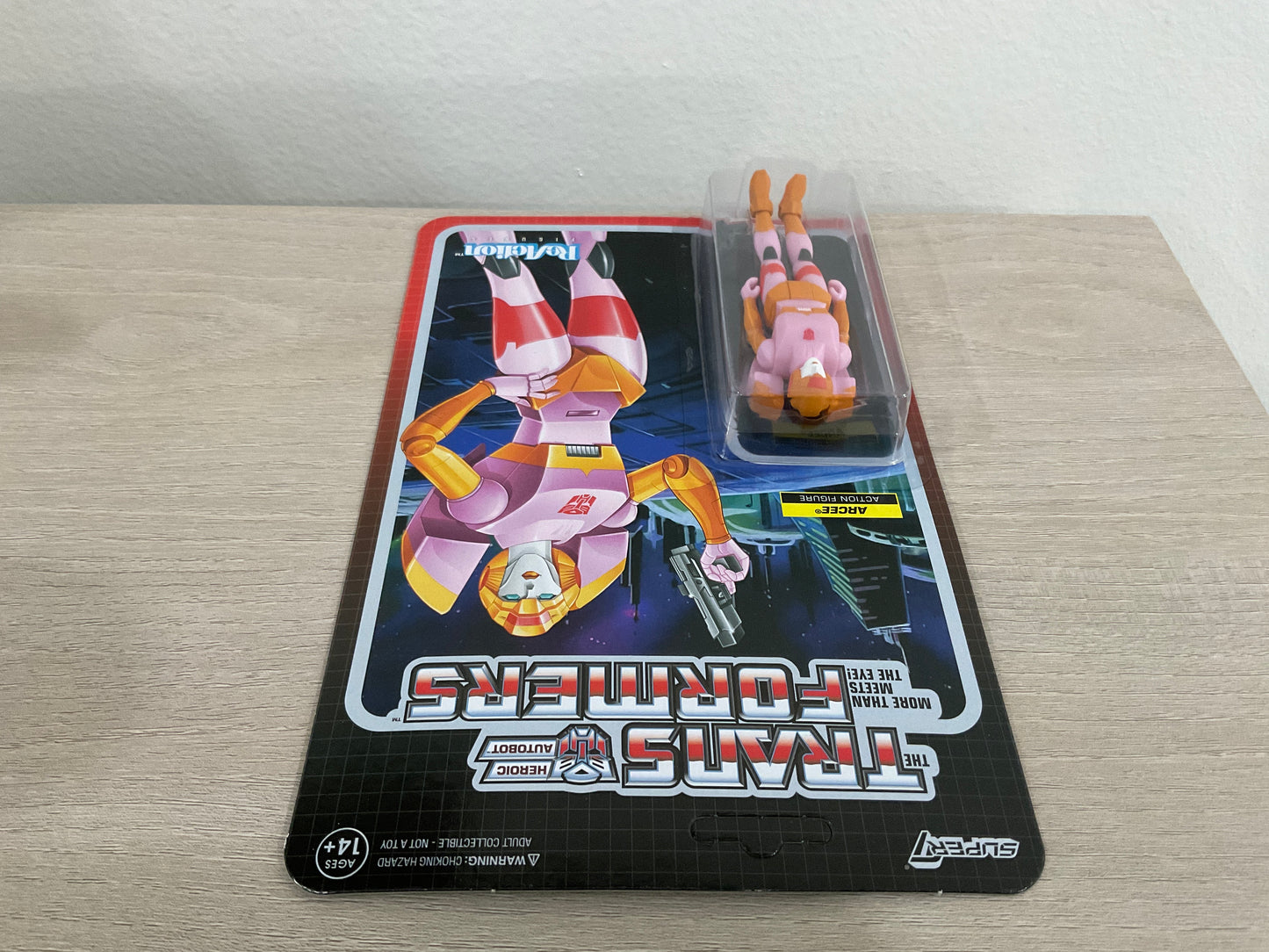 Super7 ReAction Transformers – Arcee (Pink & Orange) 3.75-Inch Action Figure