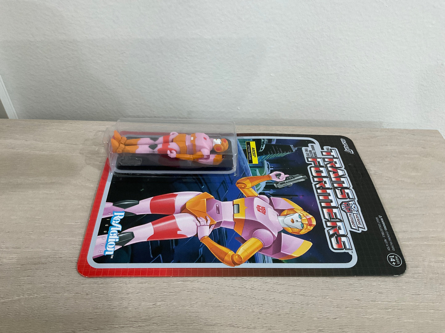 Super7 ReAction Transformers – Arcee (Pink & Orange) 3.75-Inch Action Figure