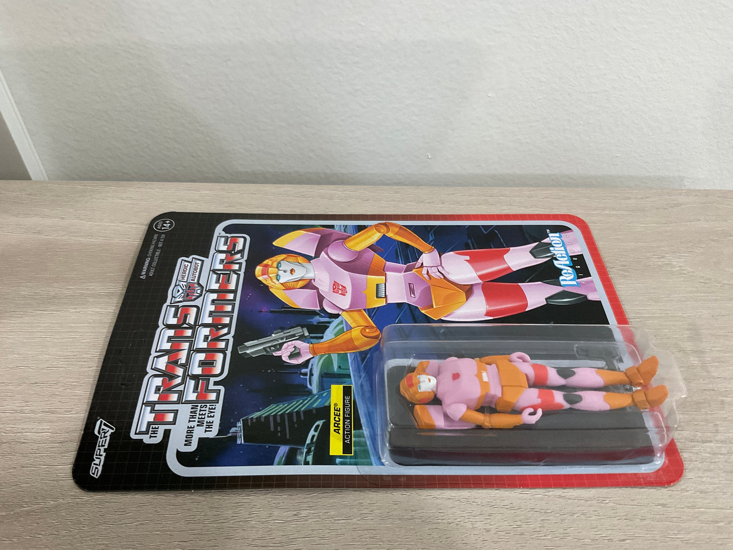 Super7 ReAction Transformers – Arcee (Pink & Orange) 3.75-Inch Action Figure