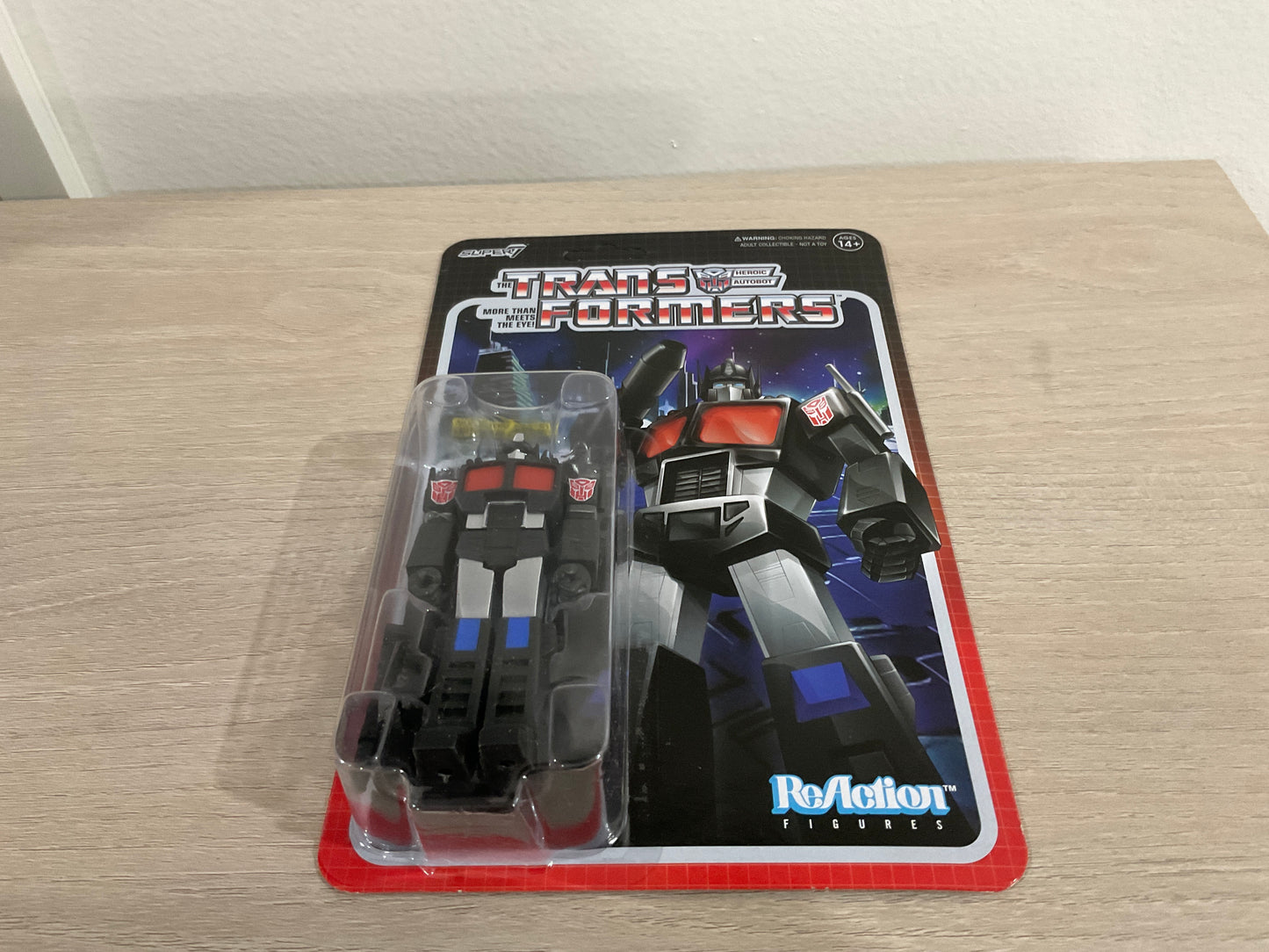 Transformers ReAction Figure – Optimus Prime (Nucleon Quest Special) 3.75-Inch by Super7