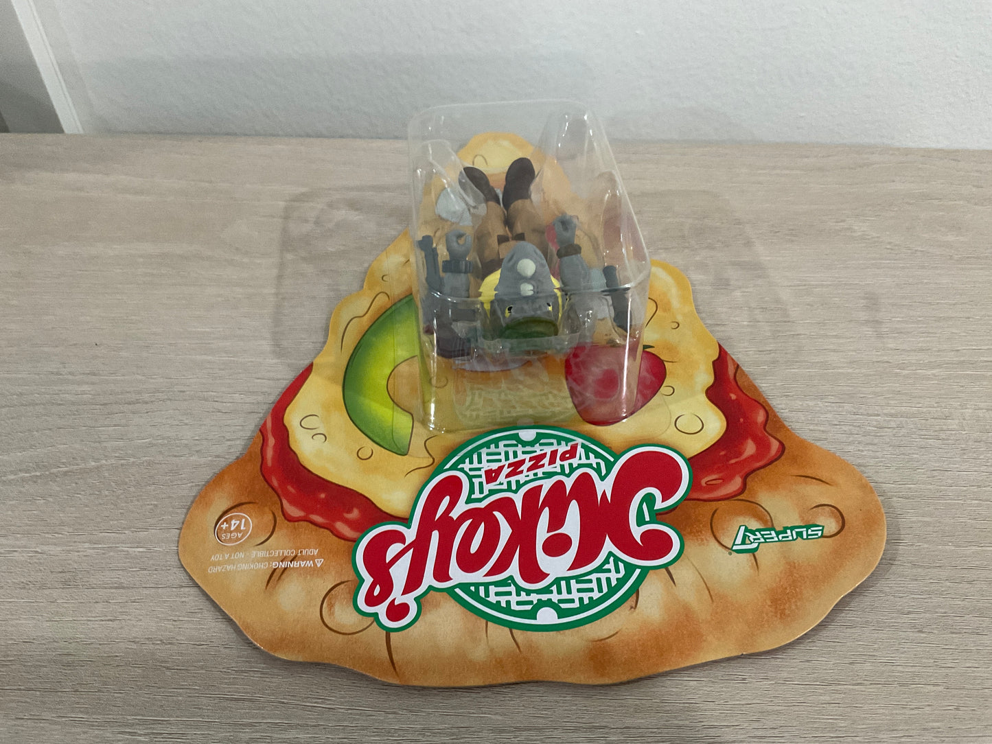 Super7 ReAction Teenage Mutant Ninja Turtles – Rocksteady “Weird Pizza To Go” 3.75-Inch Figure