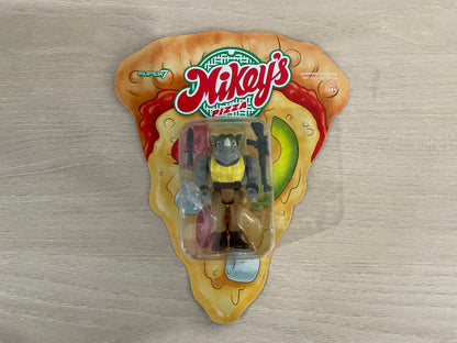 Super7 ReAction Teenage Mutant Ninja Turtles – Rocksteady “Weird Pizza To Go” 3.75-Inch Figure